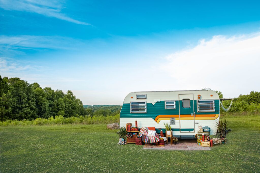 RV parked in grassy field